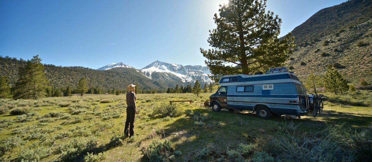 Man camping near his motorhome | Breast Cancer Car Donations