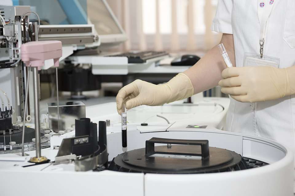 A Medical Personnel in a Laboratory | Breast Cancer Car Donations