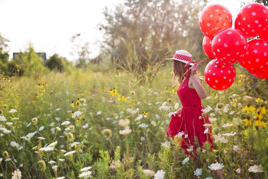 Young Woman enjoying nature this Spring | Breast Cancer Car Donations