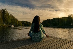 Woman Relaxing Outdoors | Breast Cancer Car Donations