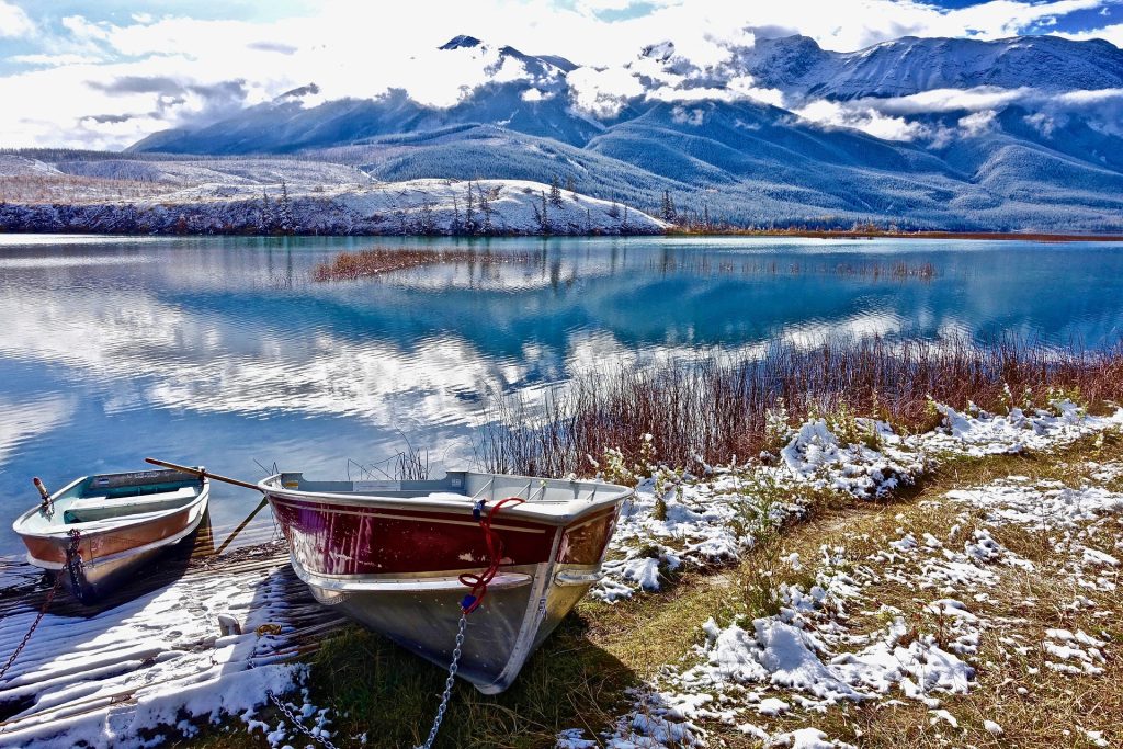 Boat in a Snowy Lake | Breast Cancer Car Donationsr.org