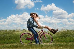 Couple taking a Bike Ride this Go for A Ride Day | Breast Cancer Car Donations