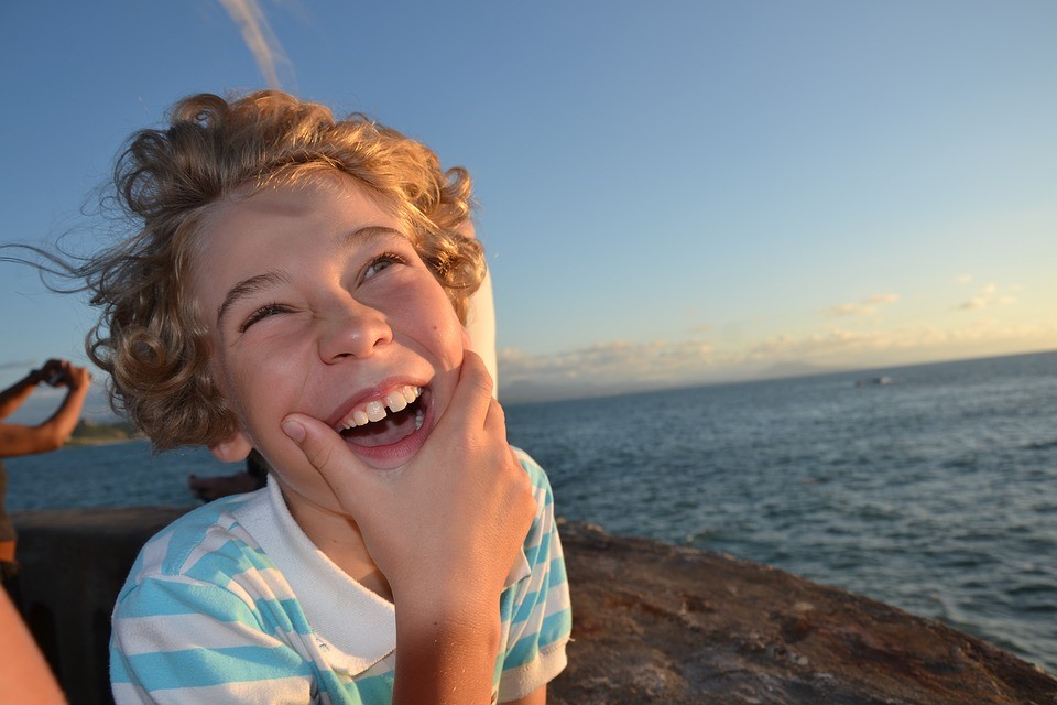 Giggling Kid on a Summer | Breast Cancer Car Donations