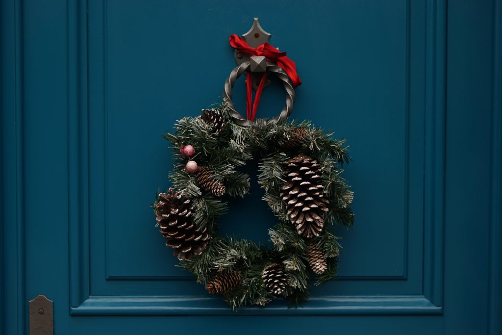 Wreath Hanging on a Door this Christmas | Breast Cancer Car Donations