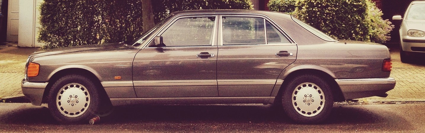 Oldtimer Sedan on the Road | Breast Cancer Car Donations