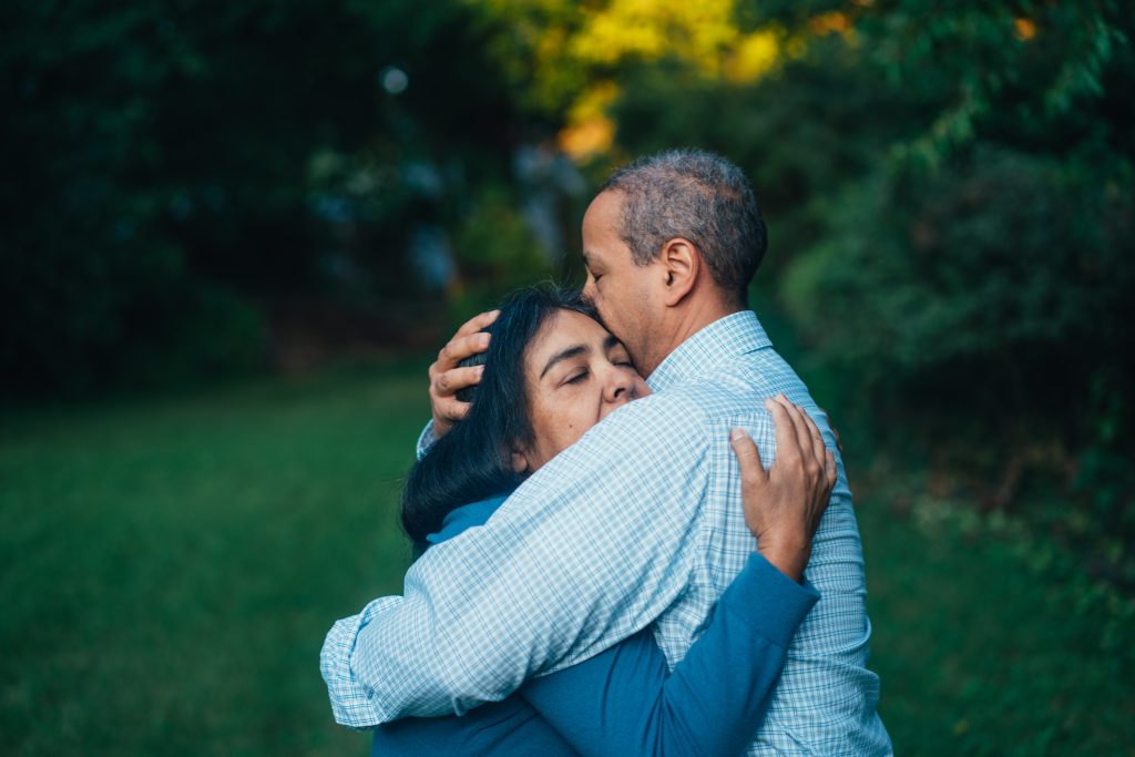 Husband and Wife Hugging | Breast Cancer Car Donations