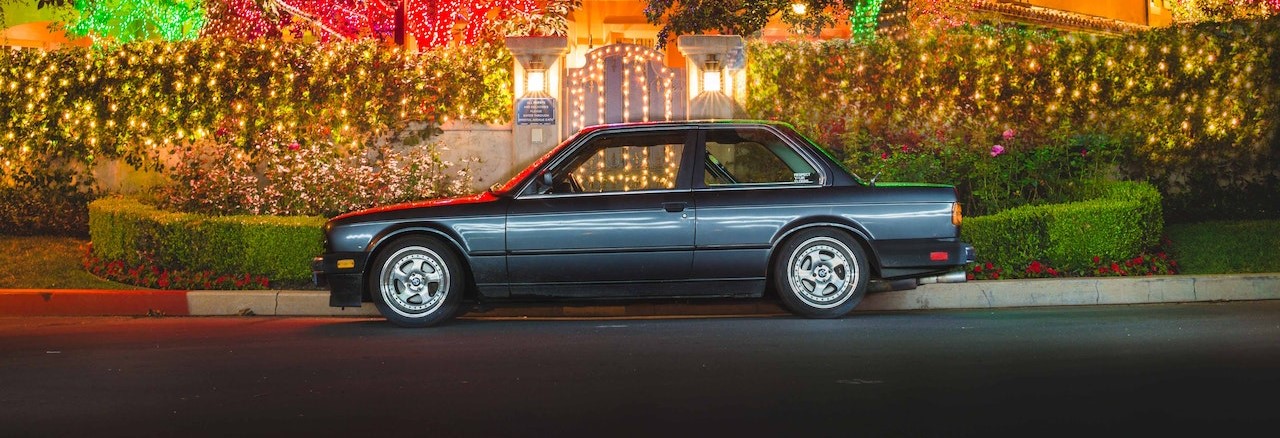 Black Sedan Parked on the Side of the Road | Breast Cancer Car Donations