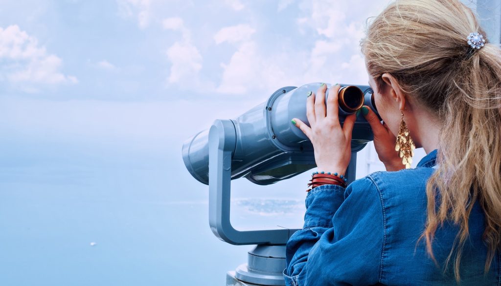 Girl on Binoculars | Breast Cancer Car Donations