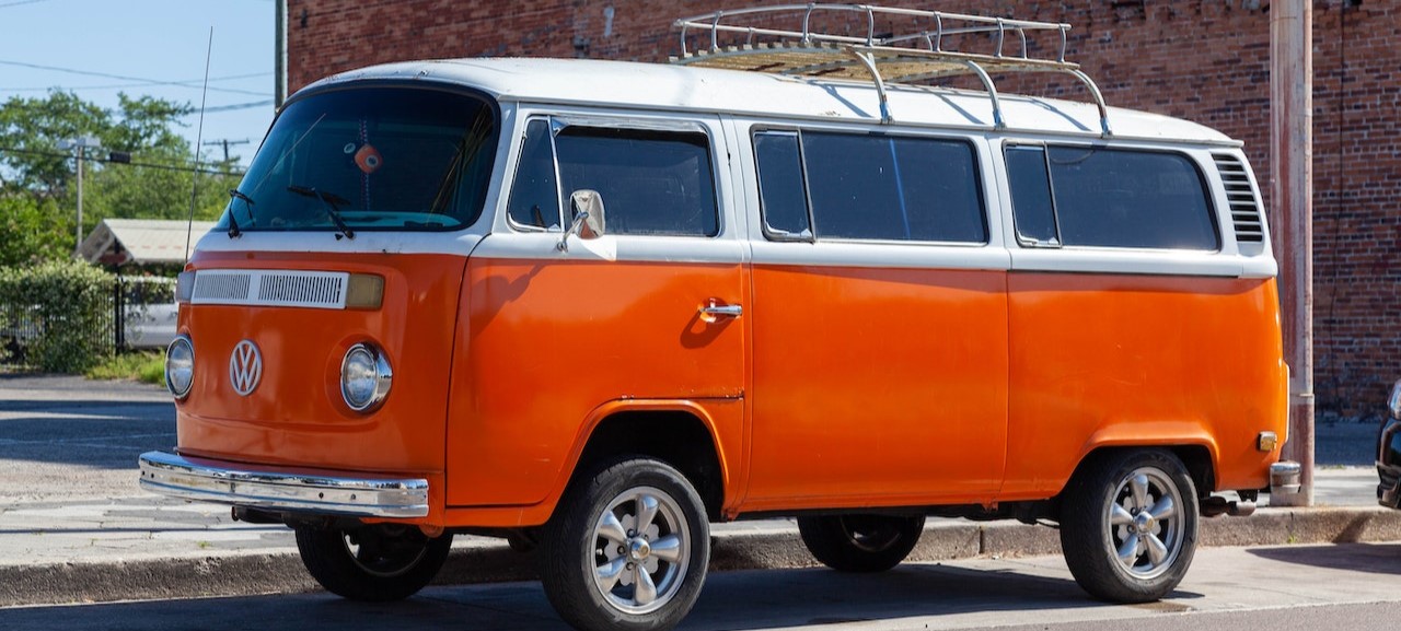 Orange Volkswagen Van on the Roadside | Breast Cancer Car Donations