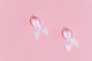 Pink Ribbons on Pink Surface | Breast Cancer Car Donations