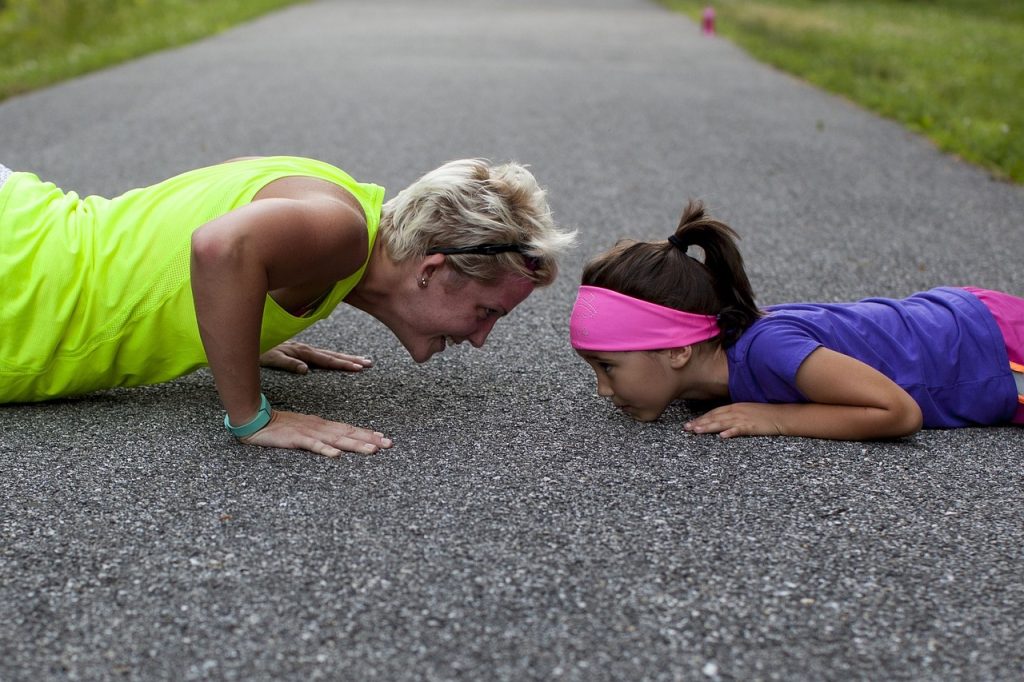 Woman and Kid Doing Excerise | Breast Cancer Car Donations