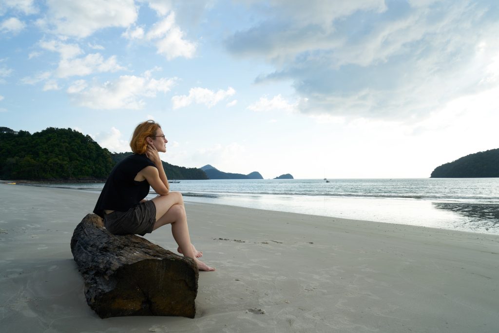 Lonely Woman at a Beach | Breast Cancer Car Donations