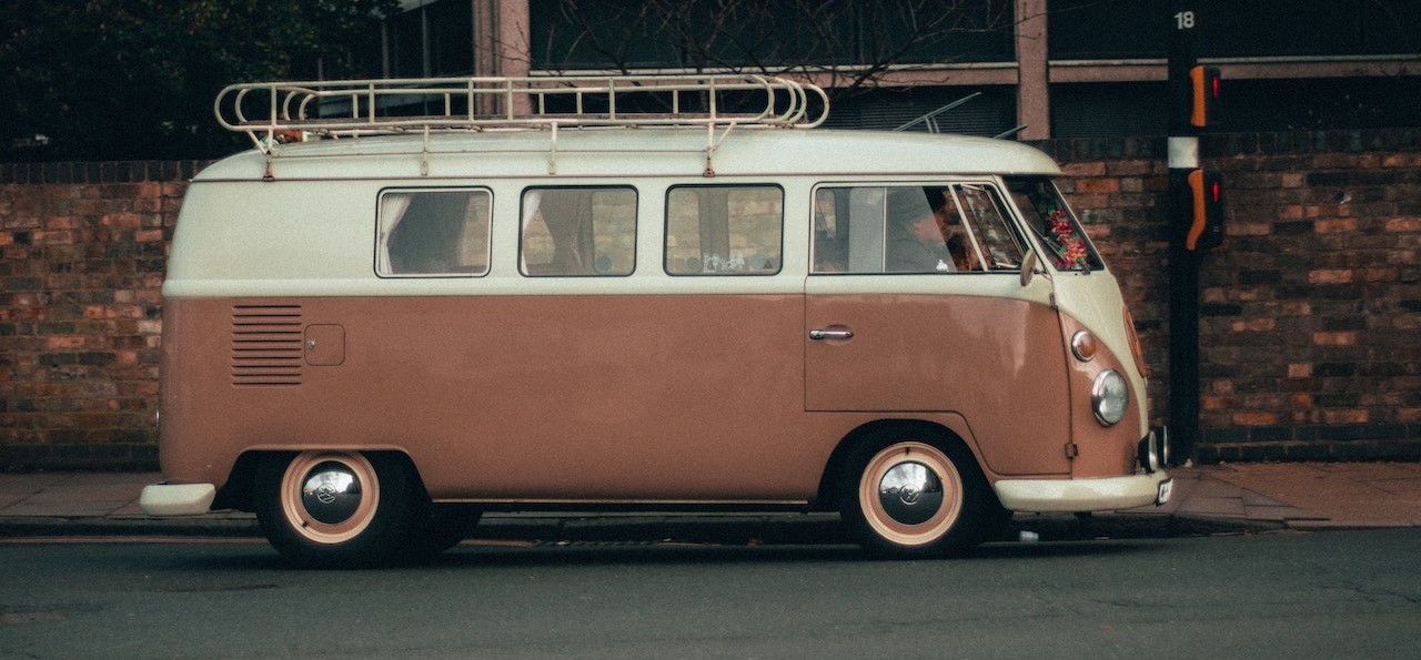 White Volkswagen Parked on the Sidewalk | Breast Cancer Car Donations