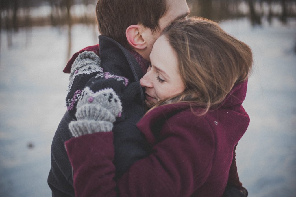 Couple in Snowy Outdoors | Breast Cancer Car Donations