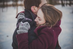 Couple in Snowy Outdoors | Breast Cancer Car Donations