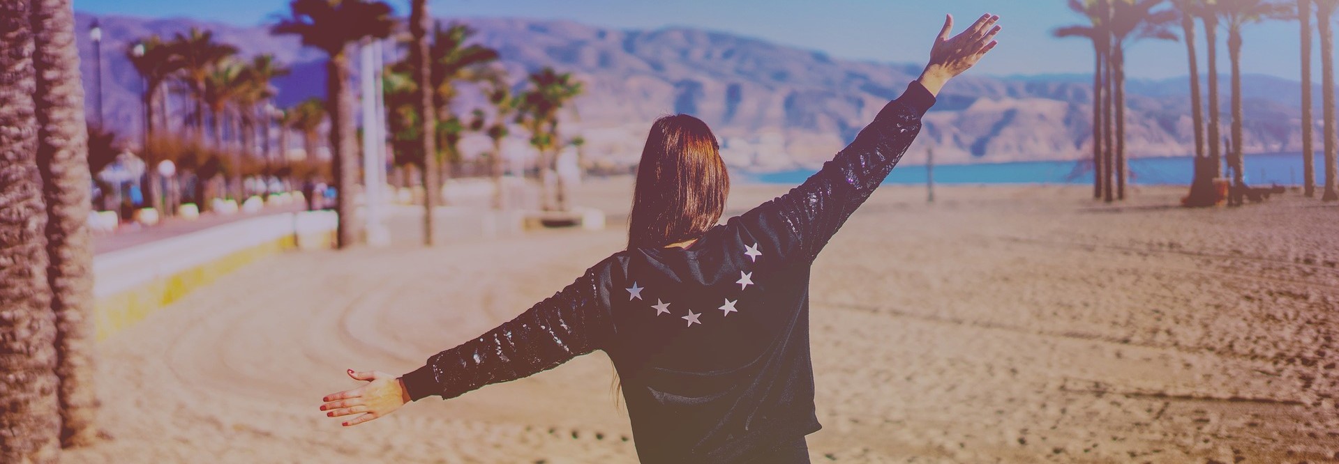 Happy Woman at a Beach side | Breast Cancer Car Donations