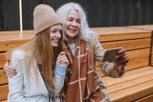 Grandmother and Teenager Taking a Selfie | Breast Cancer Car Donations