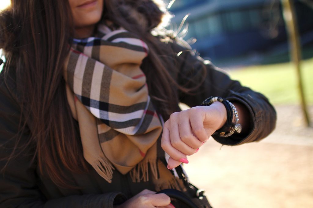 Woman Checking Her Watch | Breast Cancer Car Donations