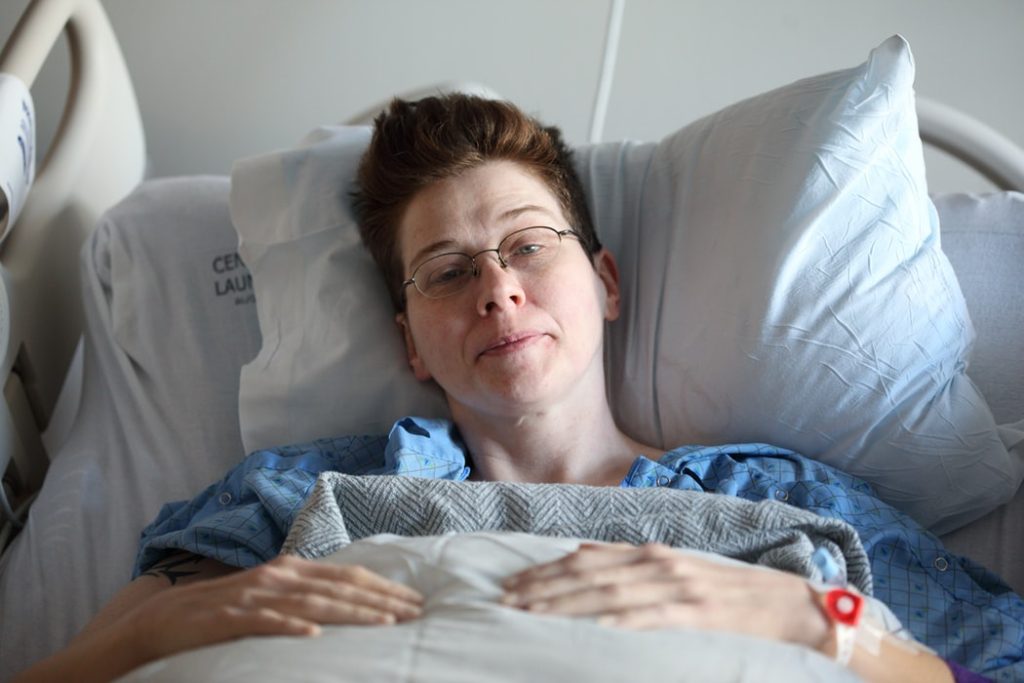 Woman on a Hospital Bed | Breast Cancer Car Donations