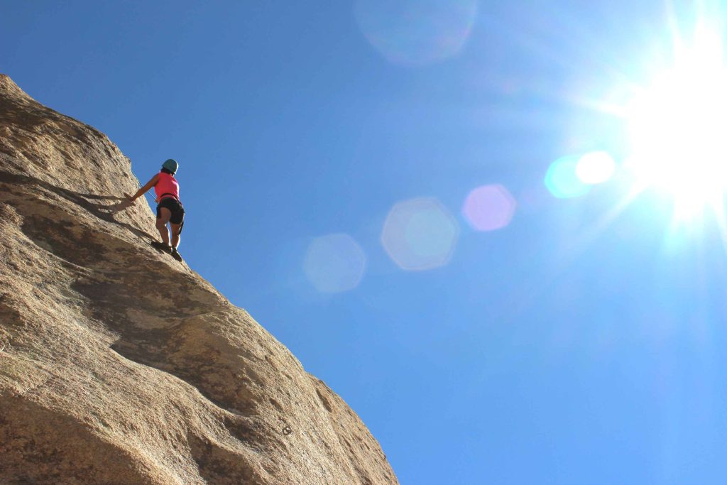Woman Doing Mountain Climbing | Breast Cancer Car Donations