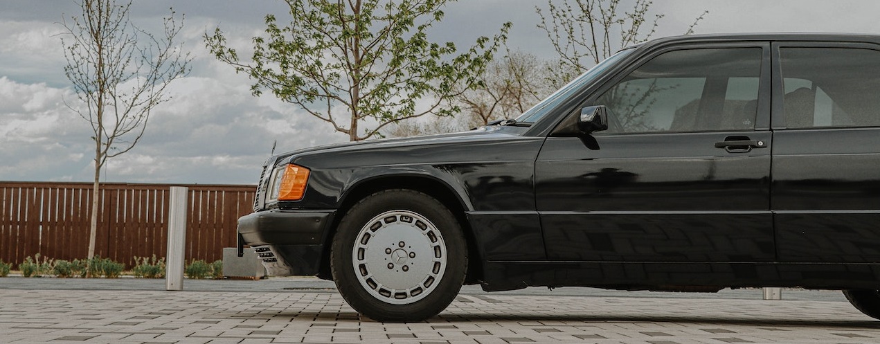 Black coupe classic parked | Breast Cancer Car Donations