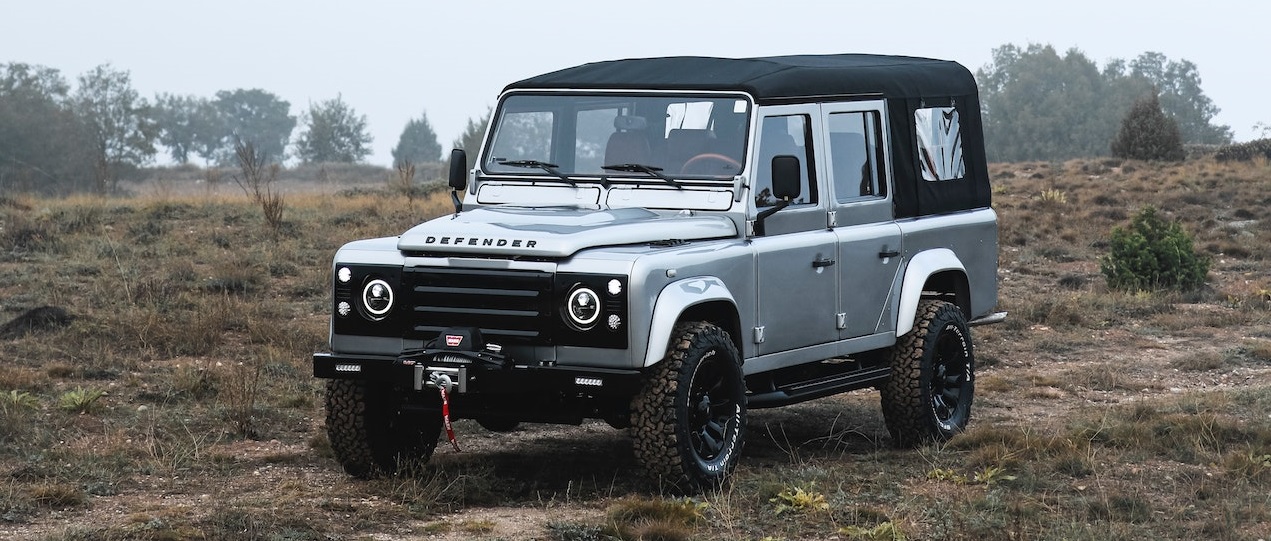 Silver Jeep SUV parked on grass | Breast Cancer Car Donations
