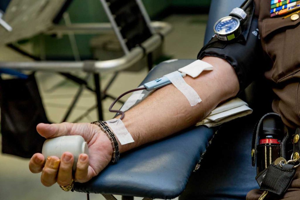 Person Donating Blood | Breast Cancer Car Donations