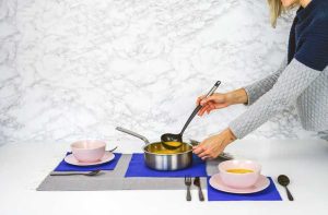 Woman Serving Soup | Breast Cancer Car Donations