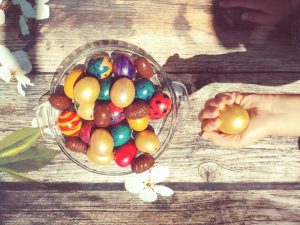 Child Holding Golden Egg | Breast Cancer Car Donations