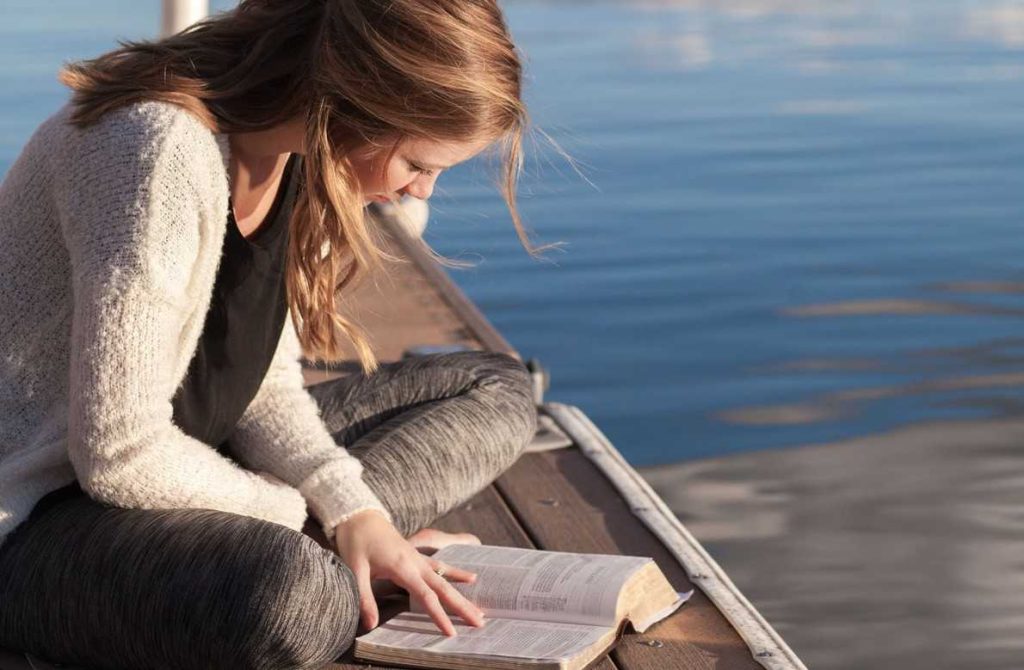 Woman Reading a Book | Breast Cancer Car Donations