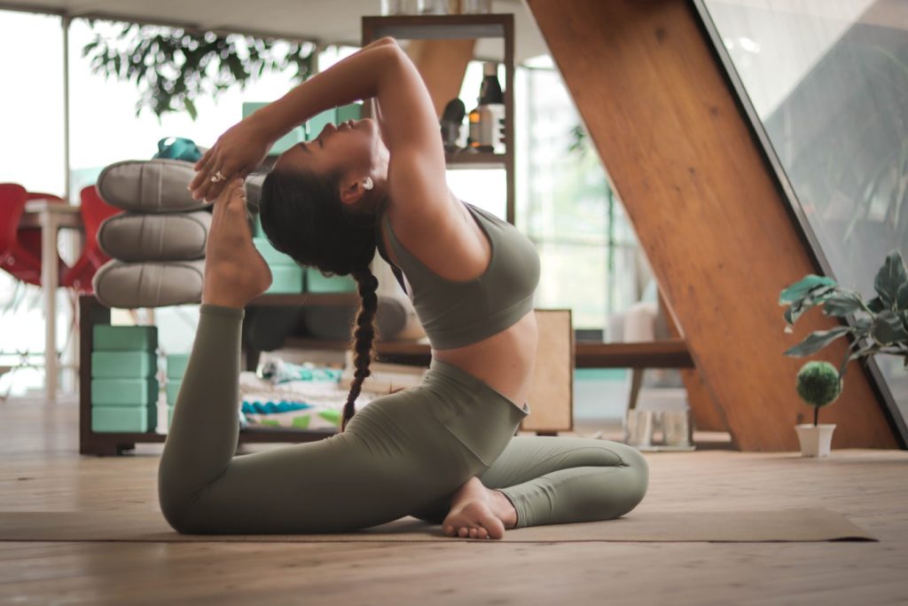 Woman Doing Yoga | Breast Cancer Car Donations