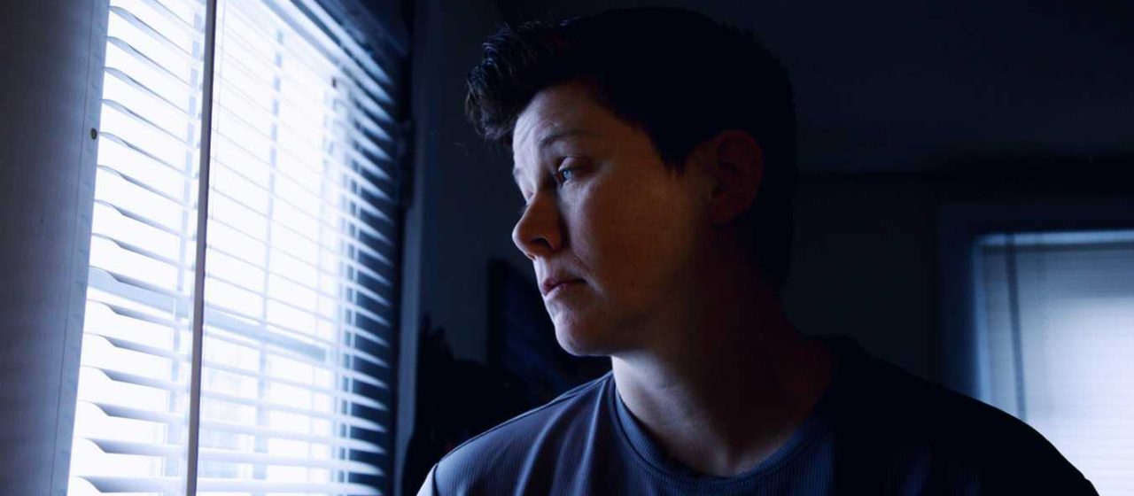 Woman Looking at the Window | Breast Cancer Car Donations