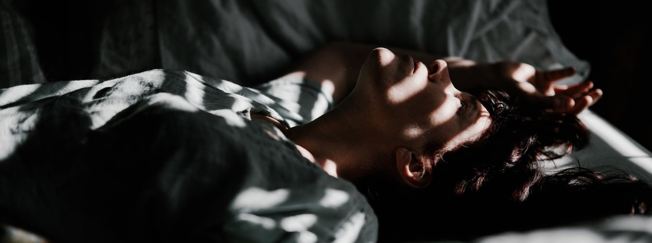 Woman Resting at her Bed | Breast Cancer Car Donations