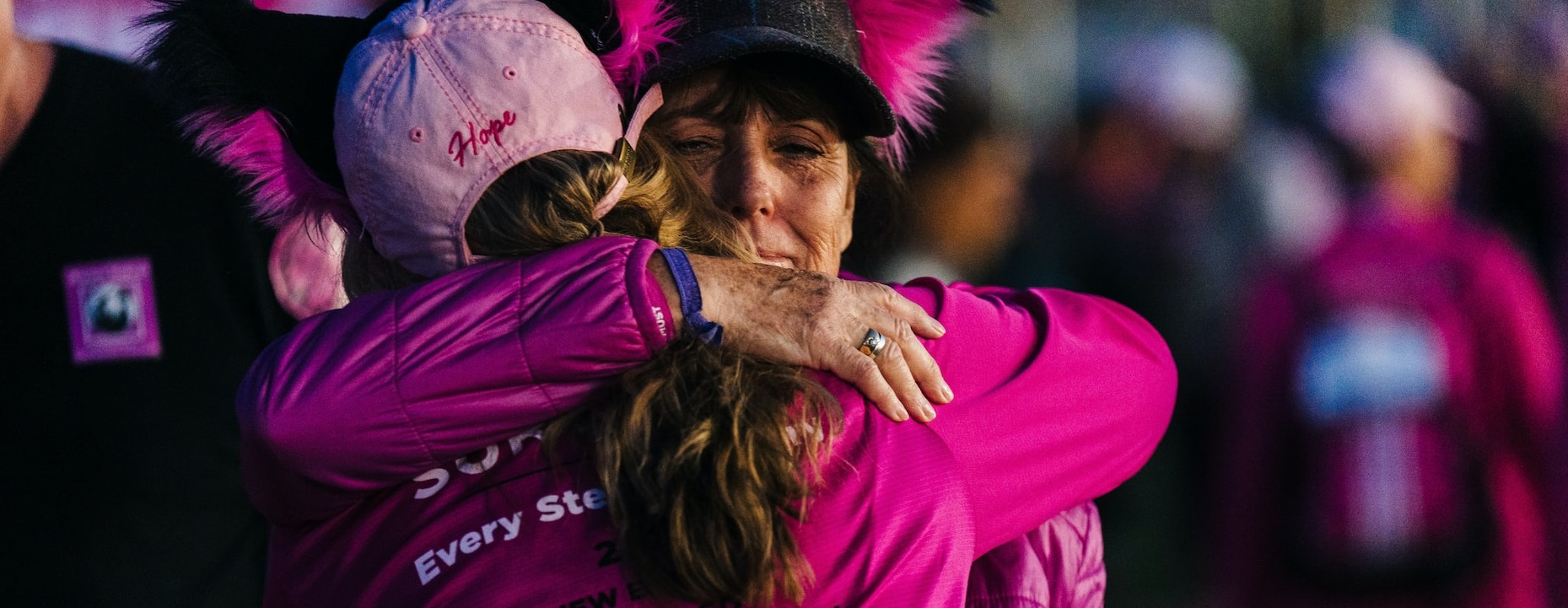 Woman hugging another woman | Breast Cancer Car Donations
