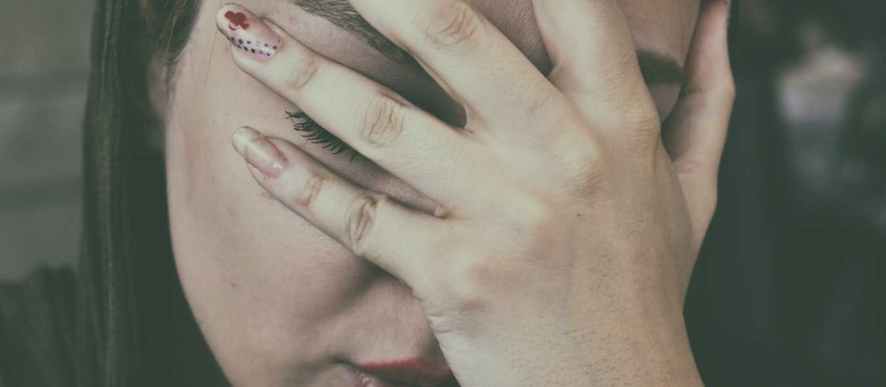 Woman's Hand on Face | Breast Cancer Car Donations
