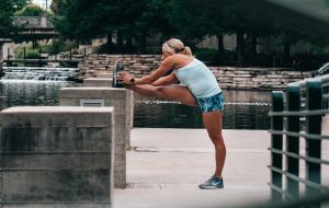 Woman Doing Outdoor Exercise | Breast Cancer Car Donations