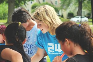 Young Volunteer Helping the Community | Breast Cancer Car Donations