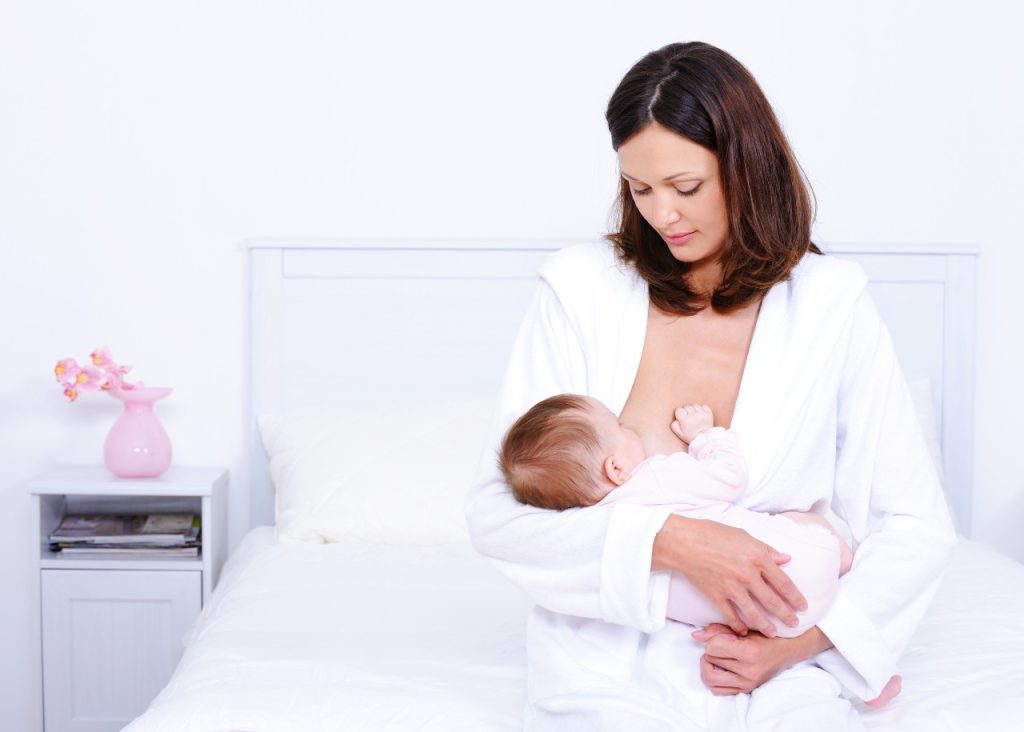 Mother Breast Feeding Her Baby | Breast Cancer Car Donations
