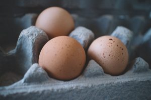 Photo of Three Eggs on Tray | Breast Cancer Car Donations