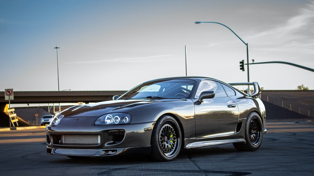 Toyota Supra Parked on Roadway | Breast Cancer Car Donations