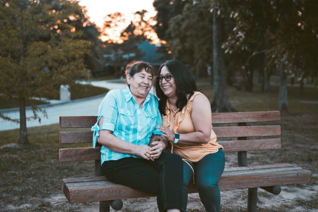 Women Sitting on a Bench | Breast Cancer Car Donations