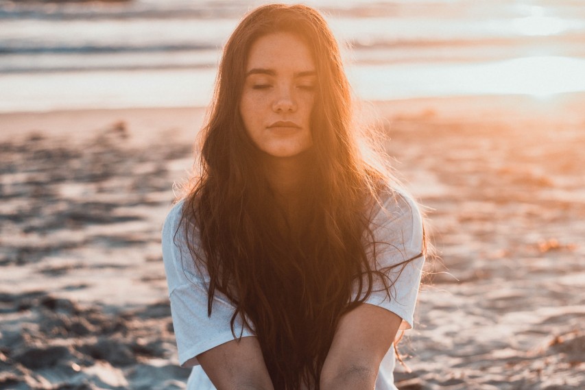 Young Woman at a Beach | Breast Cancer Car Donations