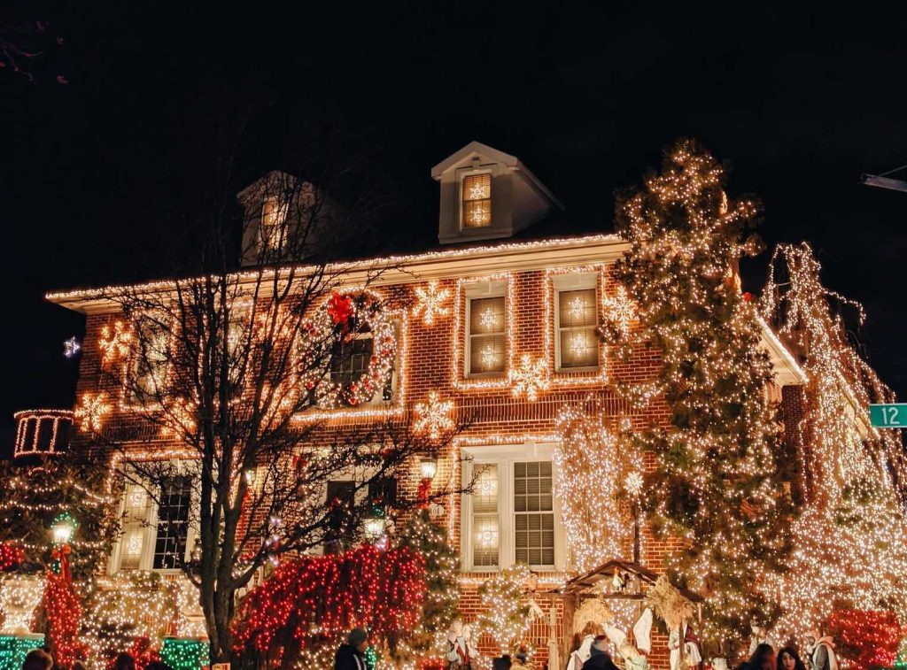 House Decorated with Christmas Lights | Breast Cancer Car Donations