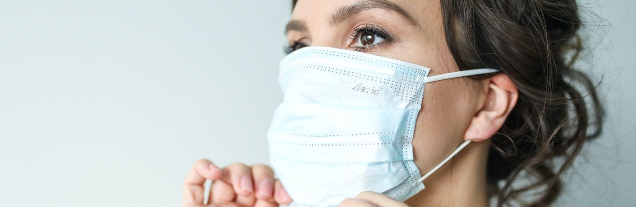 Woman Wearing a Face Mask | Breast Cancer Car Donations