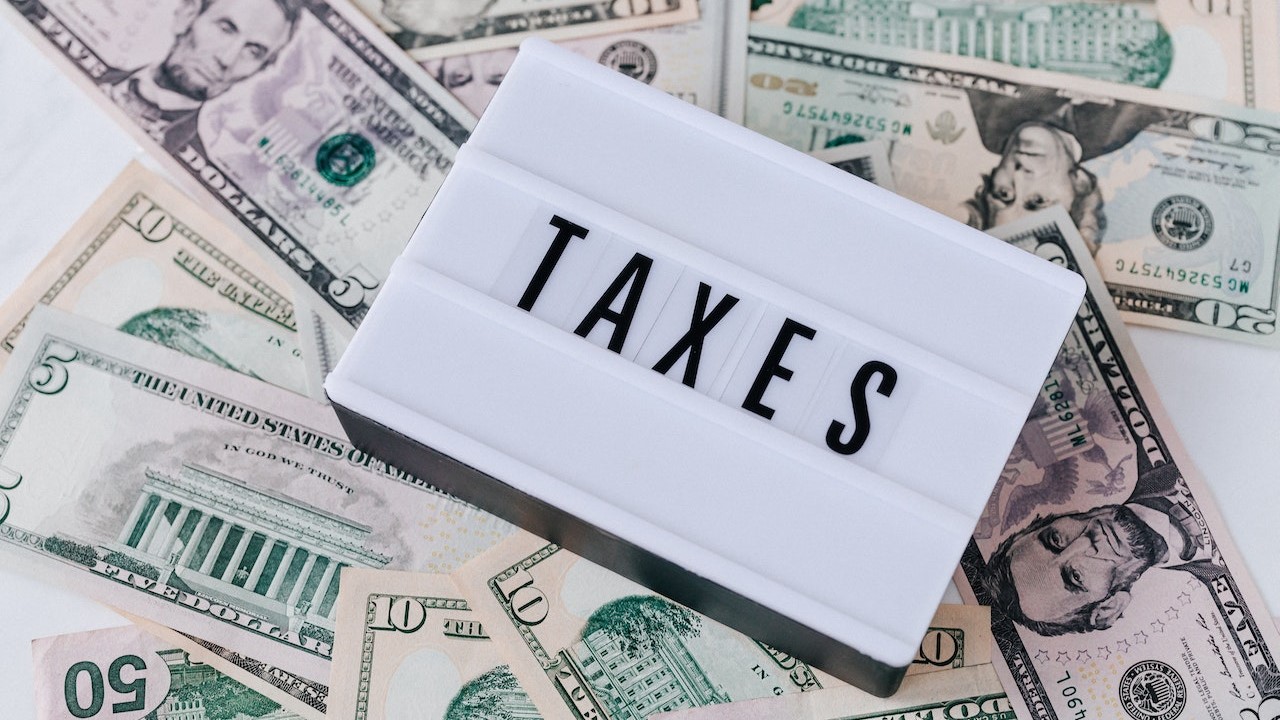 Quote Board on top of Cash Bills | Breast Cancer Car Donations