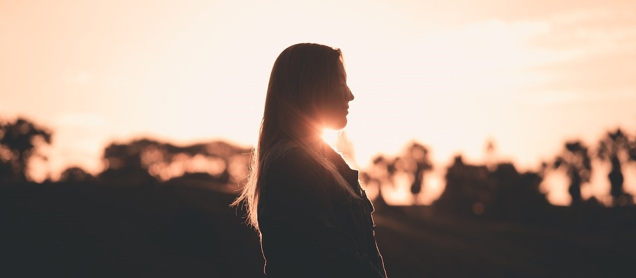 Silhouette of Woman during Golden Hour Unsplash License