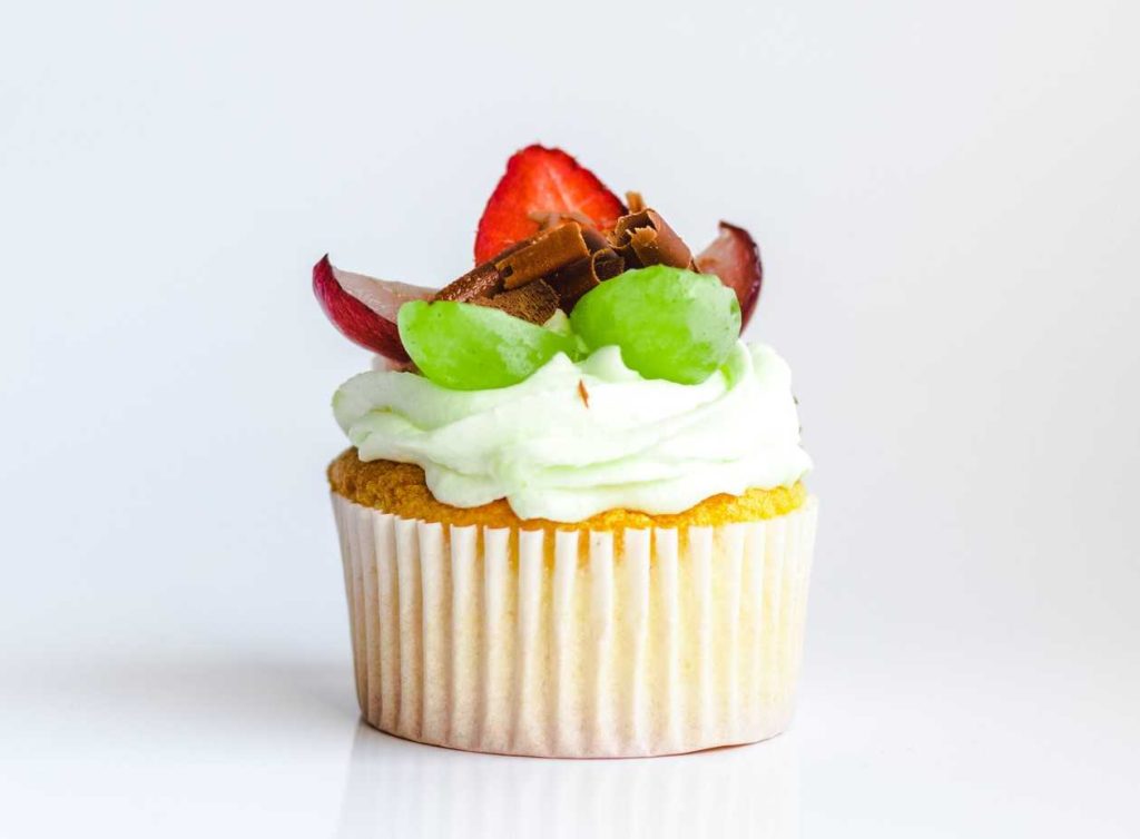 White and Yellow Cupcake With Fruit Toppings | Breast Cancer Car Donations