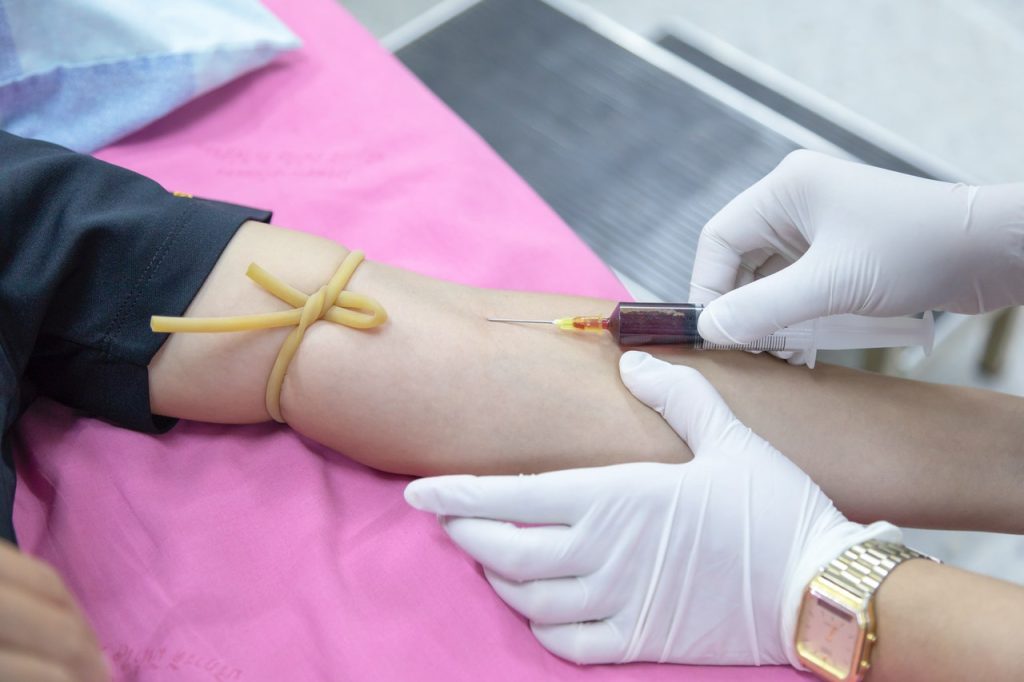 Person in Blood Donation | Breast Cancer Car Donations