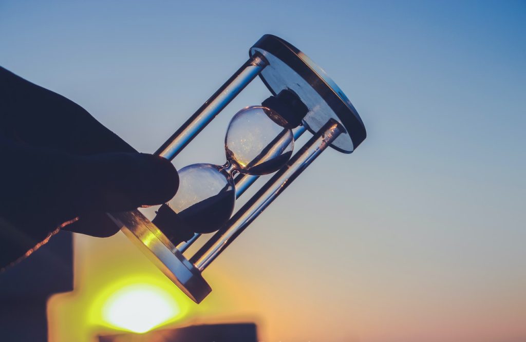 Hour Glass in Sunset | Breast Cancer Car Donations