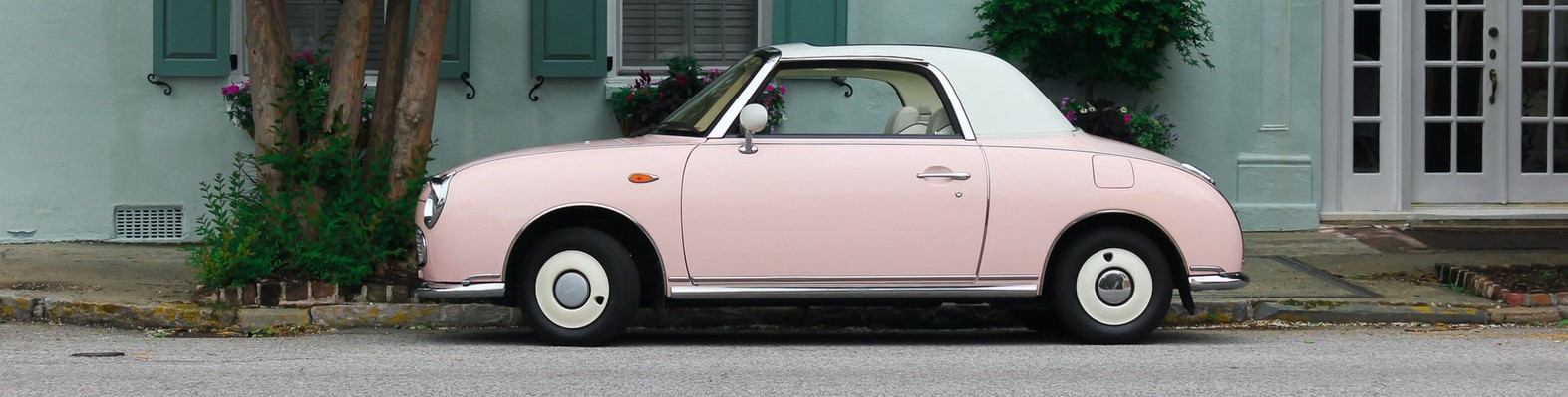 Pink Car Parked on a Street | Breast Cancer Car Donations